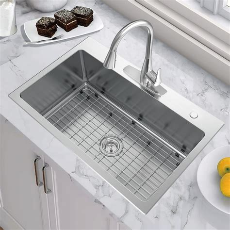 It has an engineered stone countertop with a 3-in backsplash and a ceramic undermount sink, along with a freestanding solid wood frame housing two 2-door cabinets, two tilt-down top drawers, one top drawer with internal dividers, and two regular drawers. . Allen and roth sinks